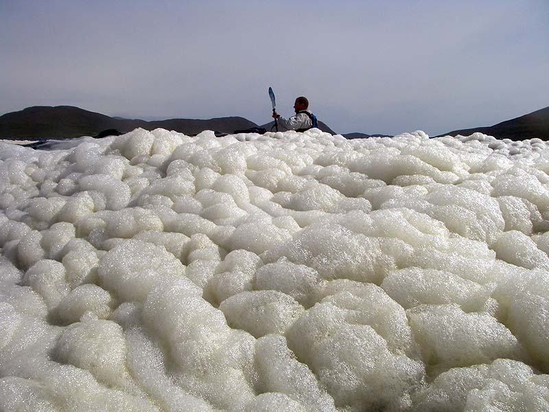 Sea kayaking on sea foam Sea kayaking on sea foam