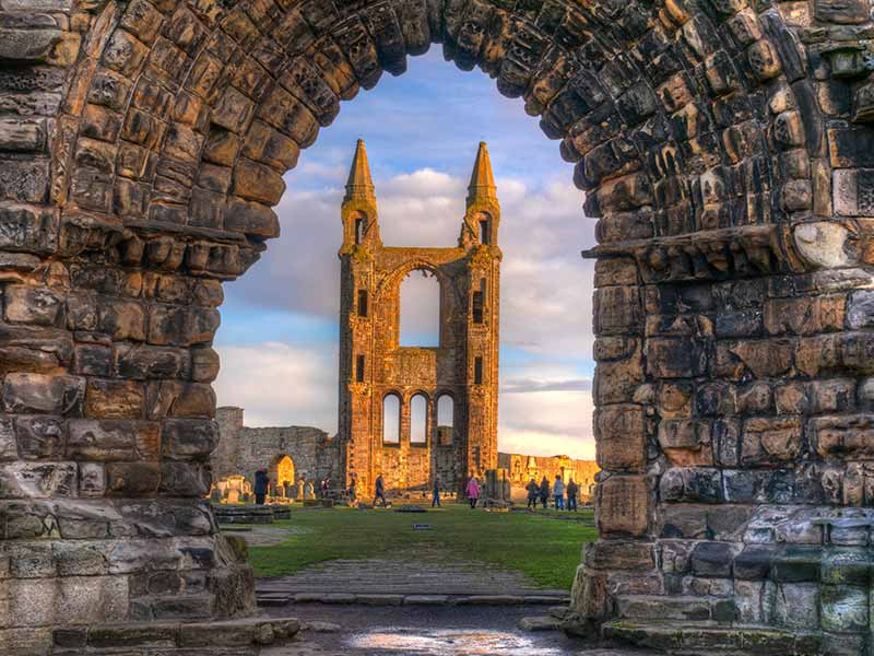 ruins of an impressive cathedral at sunset