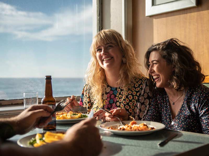 Passengers enjoying dinner in the Feast Restaurant onboard the NorthLink overnight ferry to Shetland.