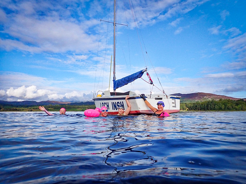 Responsible tourism - a group of women wild swimming in the Cairngorms